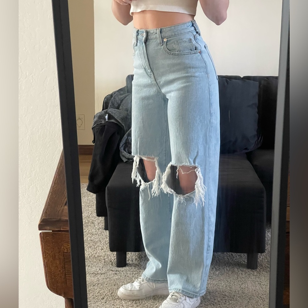 Light wash, high rise, destroyed, wide leg jeans, size 26. Worn twice